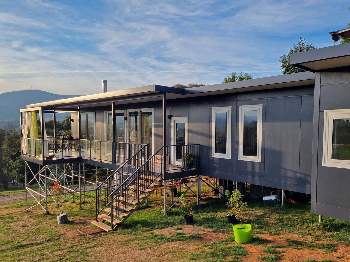 MAAP House hybrid panelised modular homes. House on a hill with views factory built House