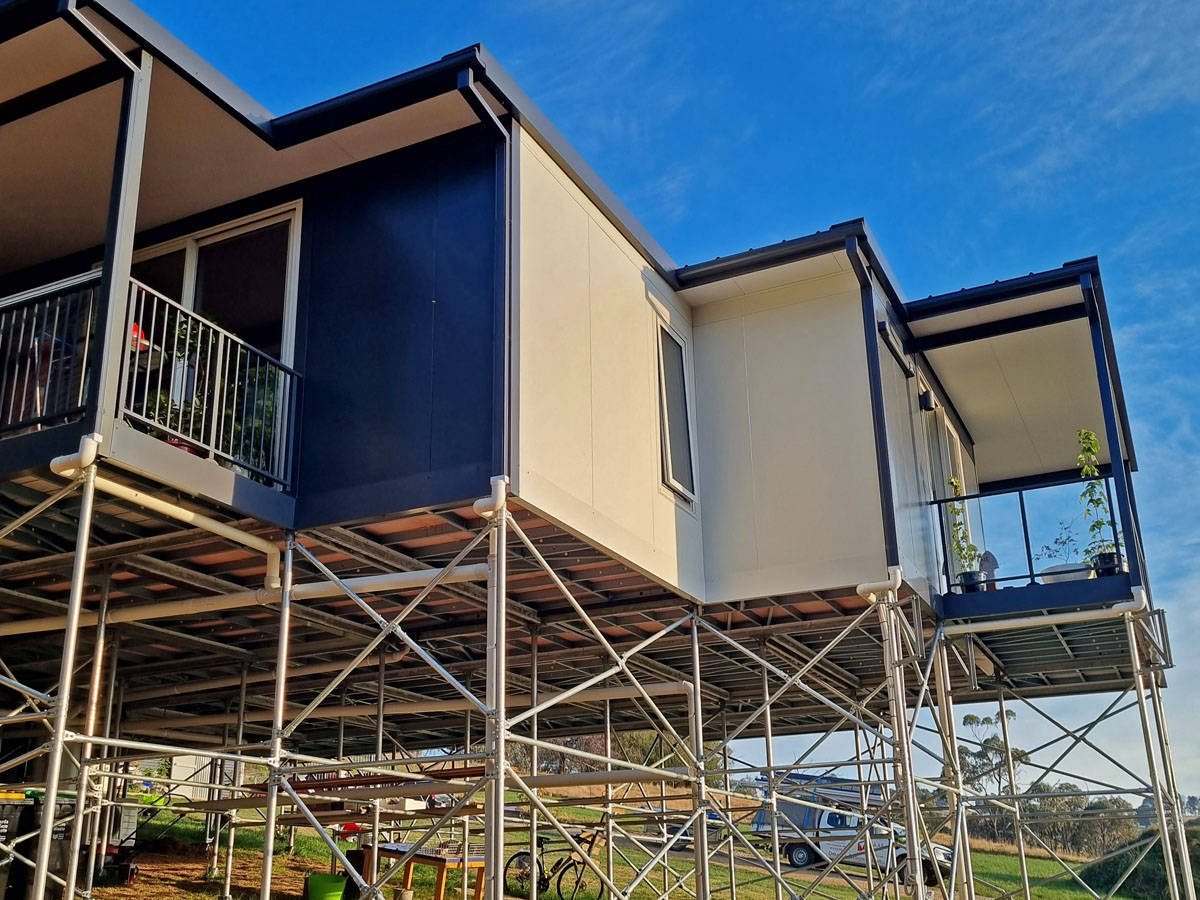 MAAP House hybrid panelised modular homes. House on a hill with views factory built House