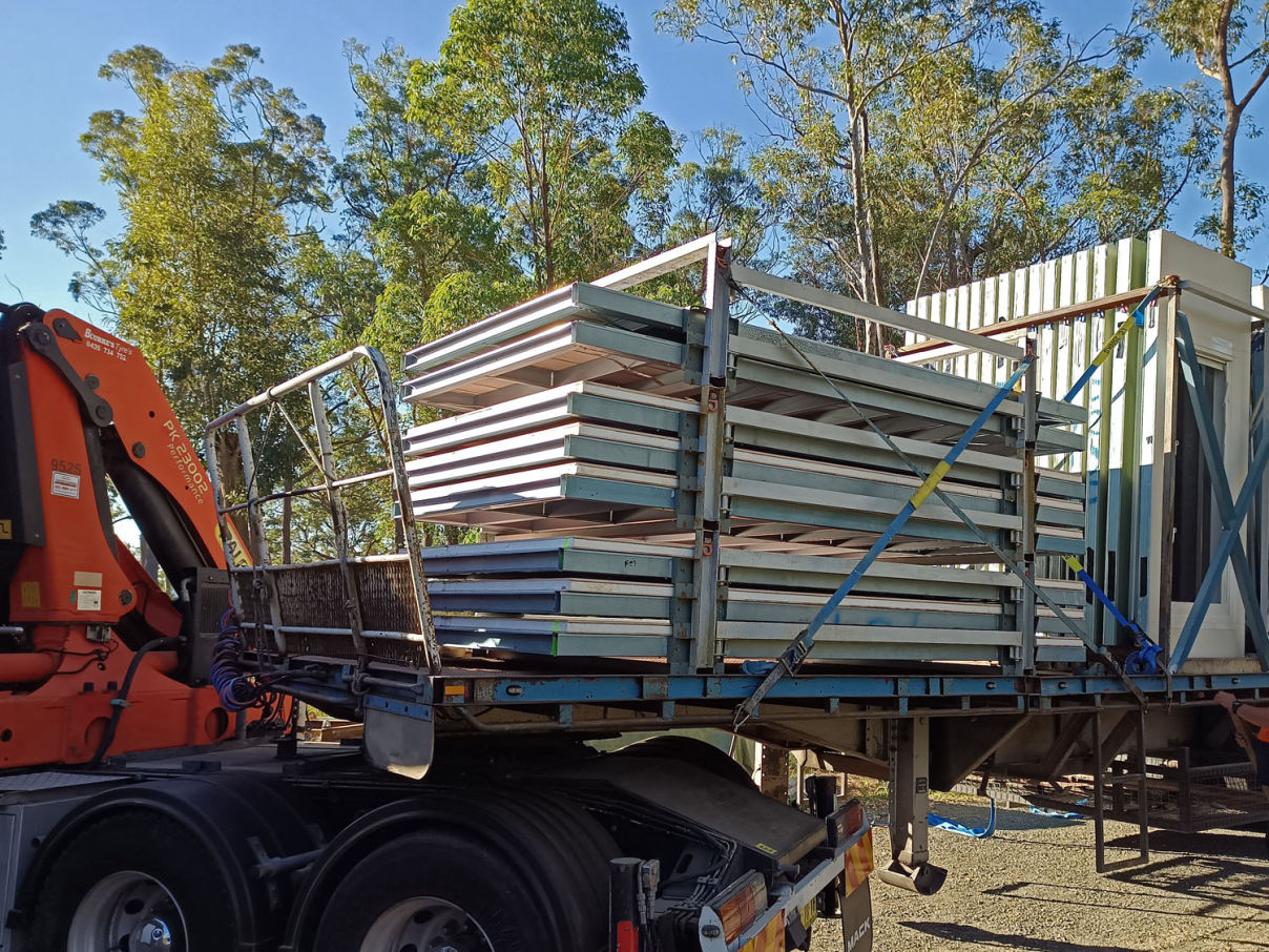 A MAAP House loaded onto a truck