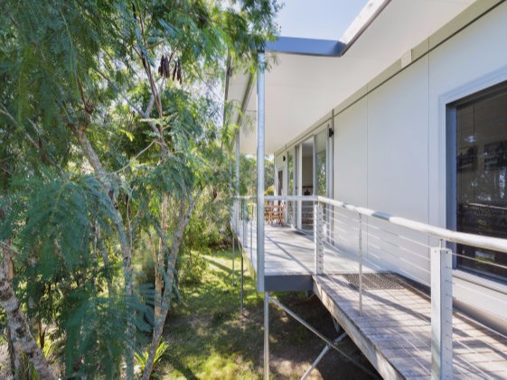 MAAP House built in amongst trees to catch the serenity of nature