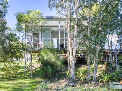 MAAP House built in amongst trees to catch the serenity of nature